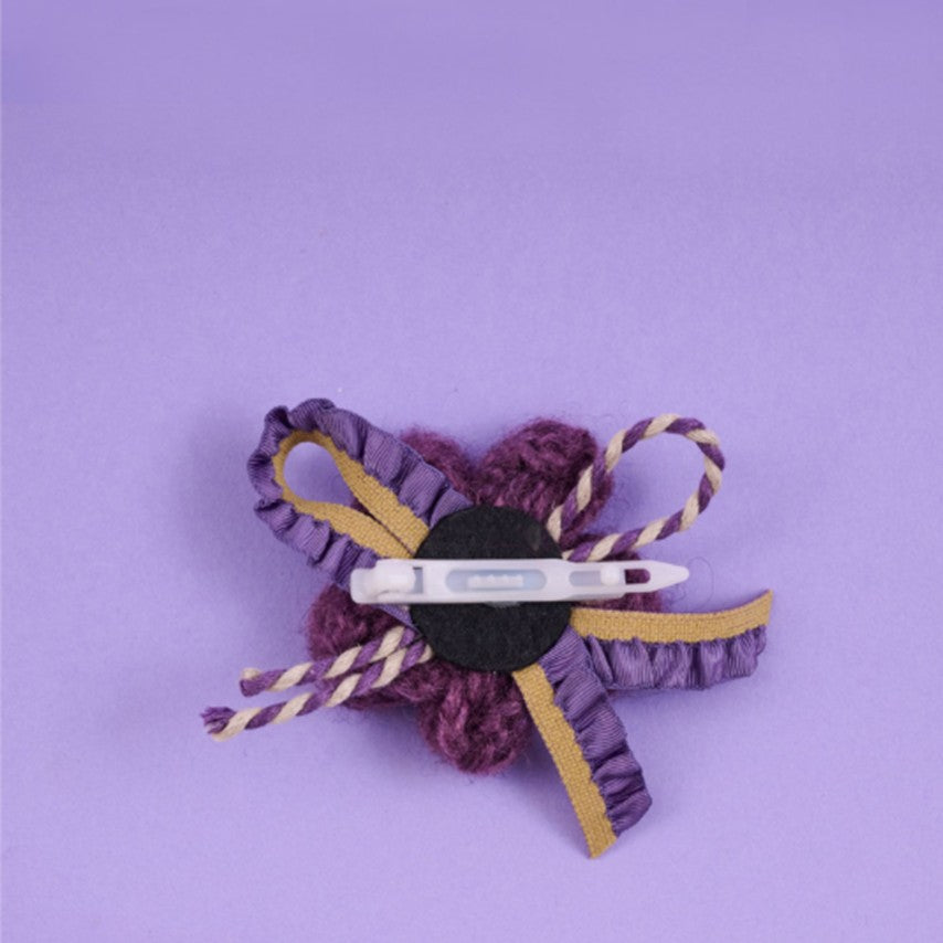 Comocomo Purple rumie pin on cloth